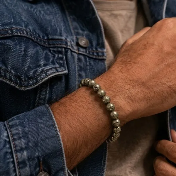 Pyrite in male hand (1).webp