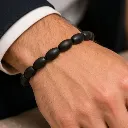 Karungali Bracelet in male hand.webp